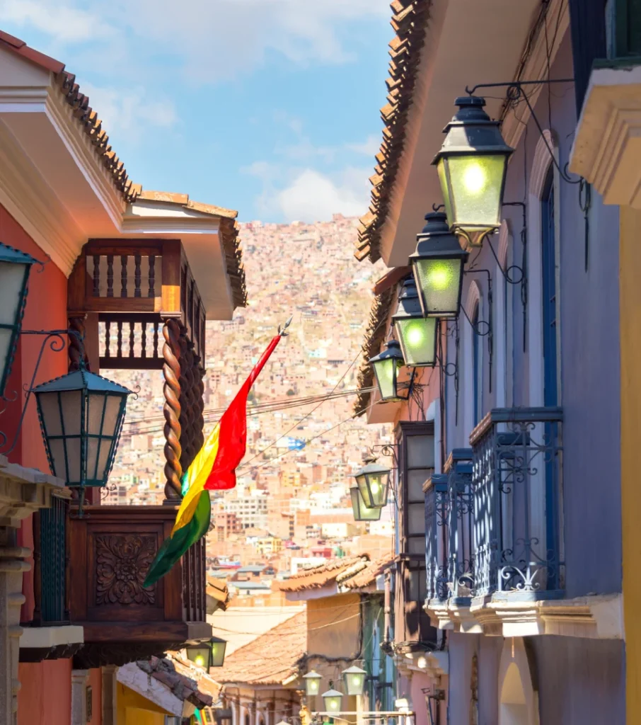 Colonial street of La Paz with Bolivian flag, Bolivia