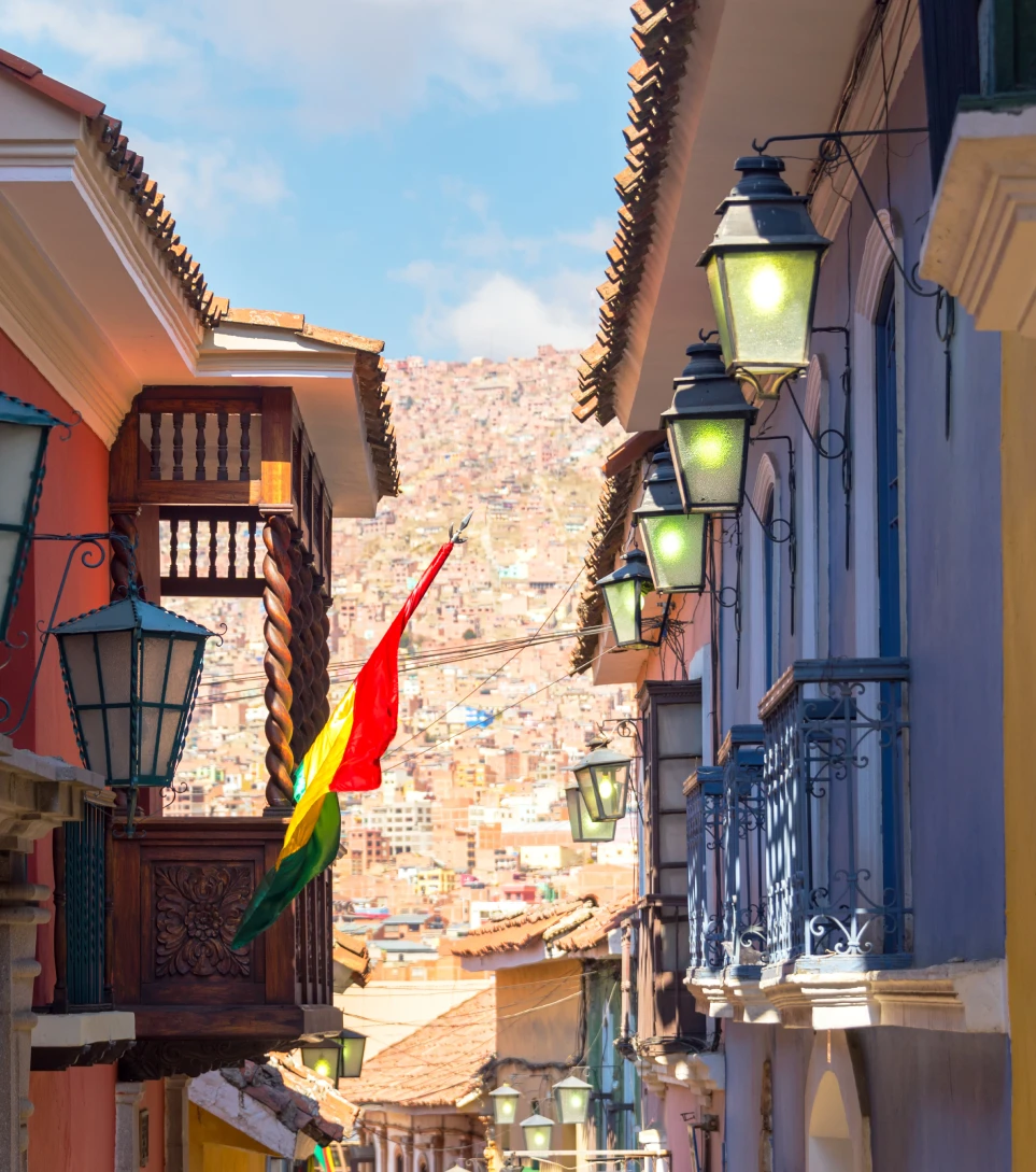 Colonial street of La Paz with Bolivian flag, Bolivia