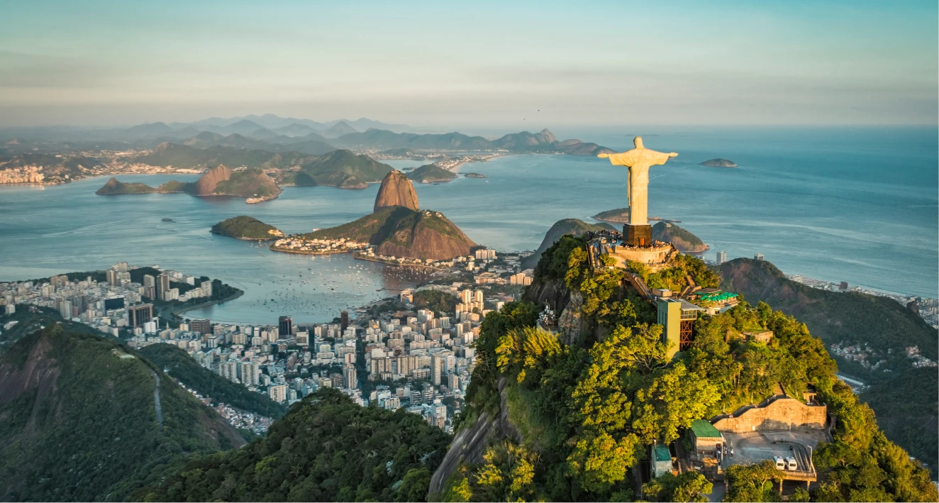 Christ the Redeemer overlooking Rio de Janeiro at sunrise